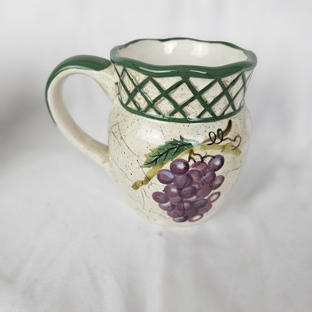 Certified International Fruit Lattice by Rayond Waites Grape, Lemon, Pear 4 Mugs
